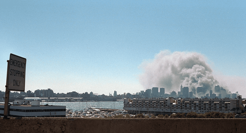 Photograph of smoke rising from the site of the World Trade Center on Tuesday, Sept. 11, 2001.